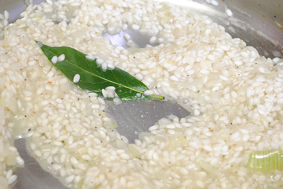 Arborio Rice with wine and a fresh bay leaf