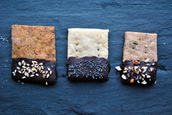 Sweet and Savory Chocolate Dipped Crackers: (From Left to Right) Spicy Chili Cornmeal Cracker with Toasted Sesame Seed, Lemon Cracker with Poppy Seeds and Rosemary Wheat Crackers with Sea Salt and Almonds for Gojee.com potluck.