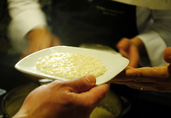 Bottura's Parmigiano-Reggiano Cheese Risotto made with a rich stock that takes about a week to prepare. 