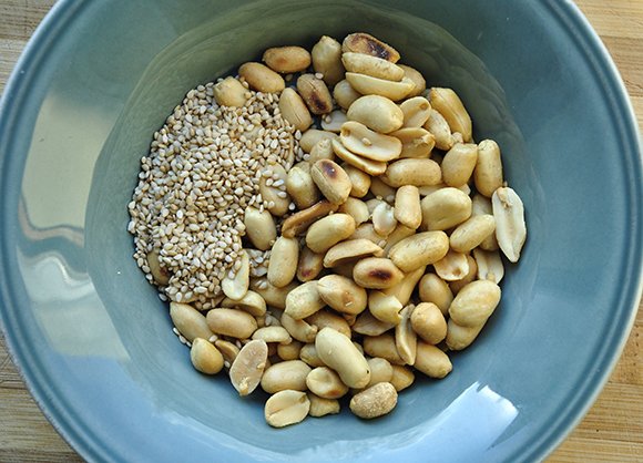 Crunchy Garnish: Toast Peanuts and Benne Seeds